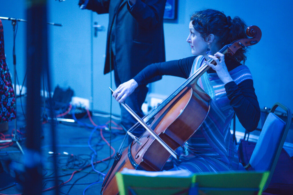 violin player from lazlo baby performing at marple music night