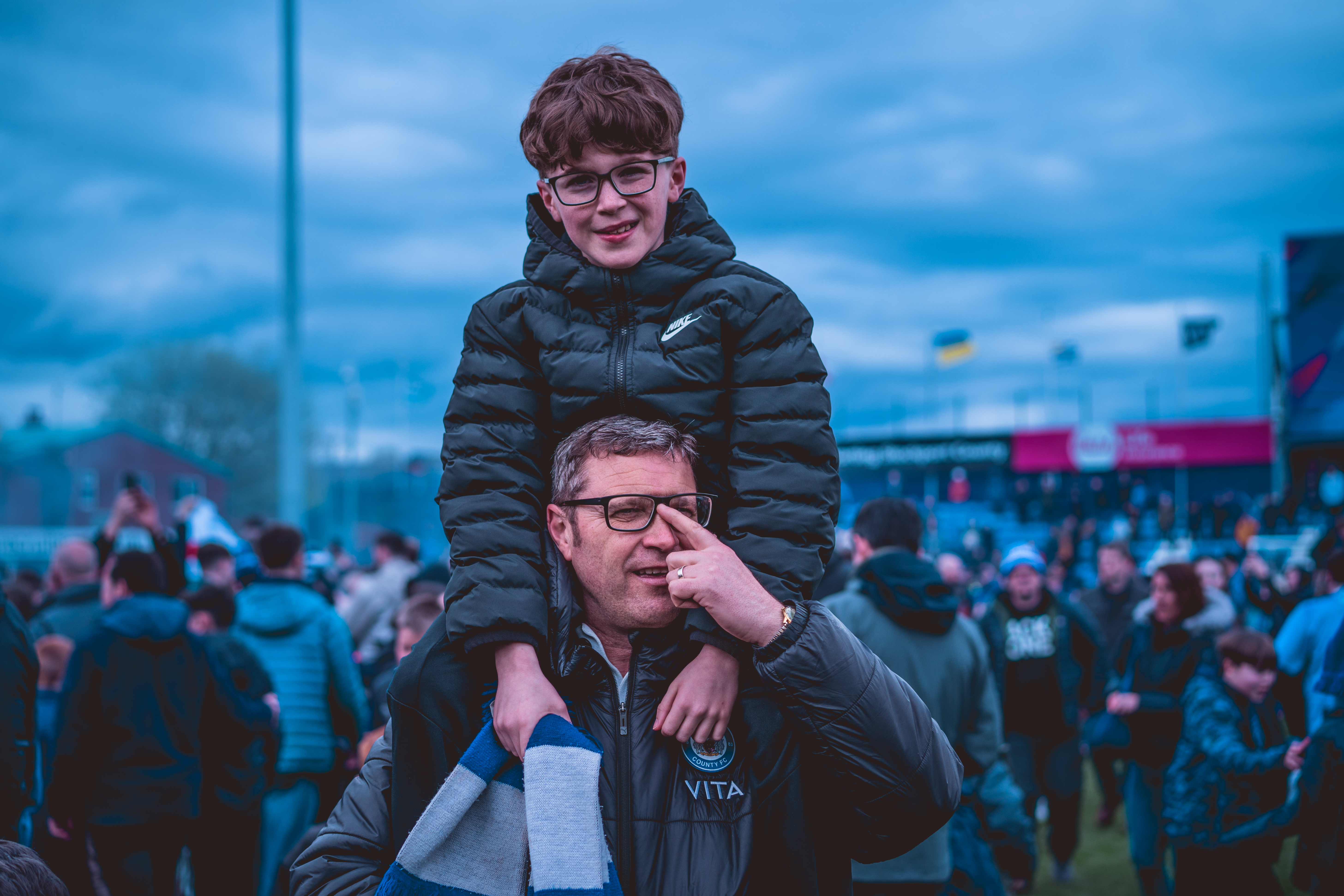 father and son celebrating stockport's win