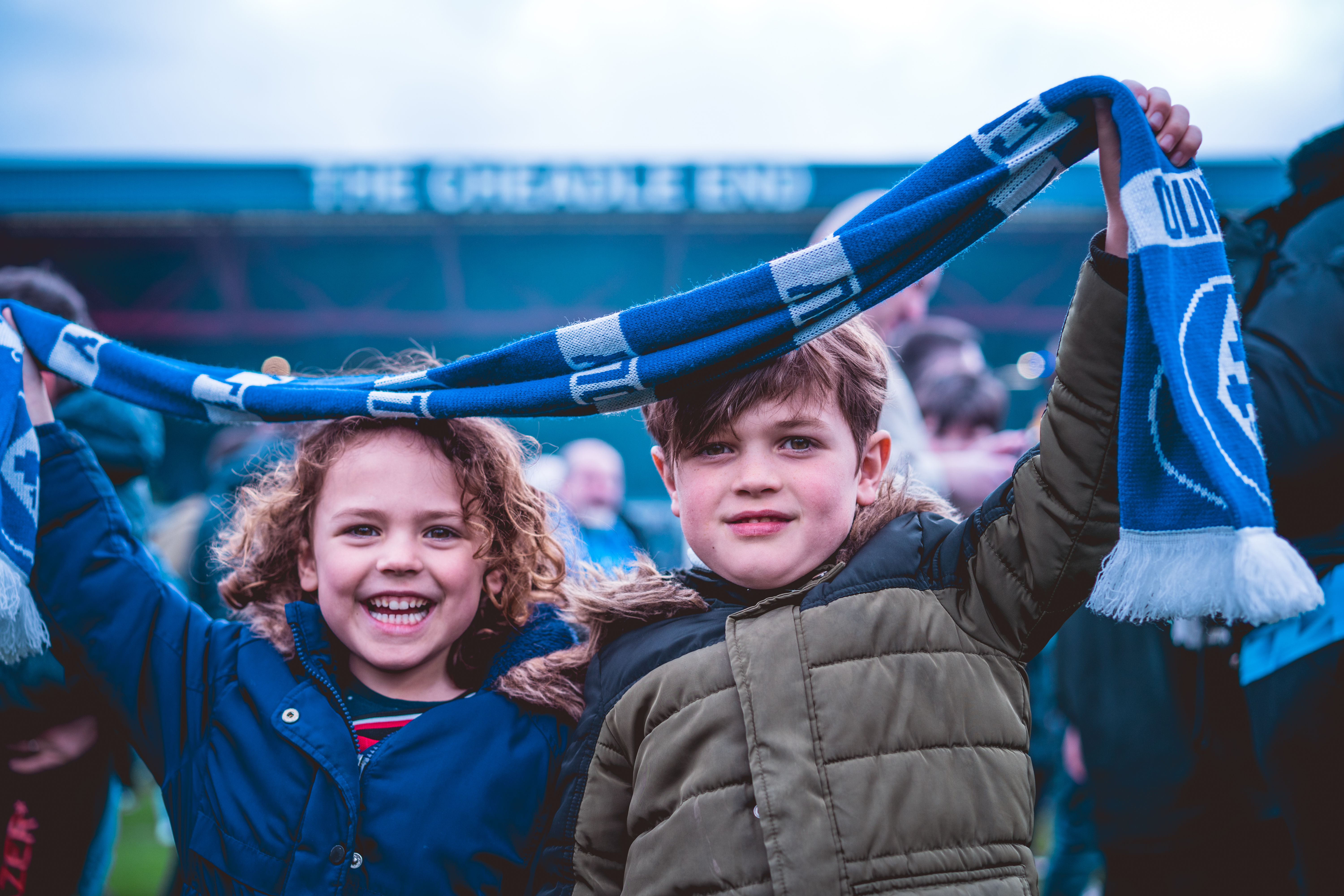 cute kids celebrating stockport county's promotion