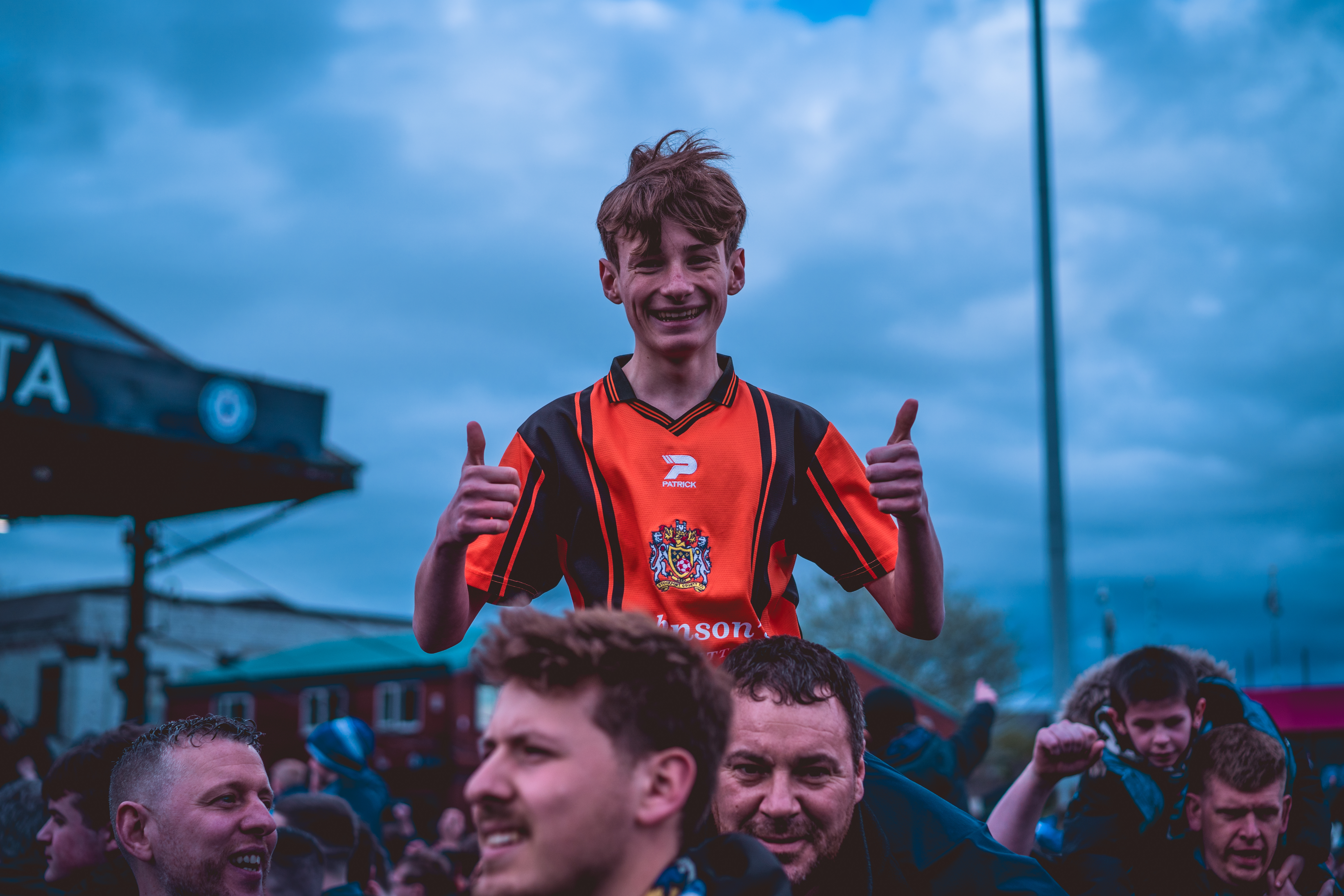 fan in vintage kit supporting stockport county