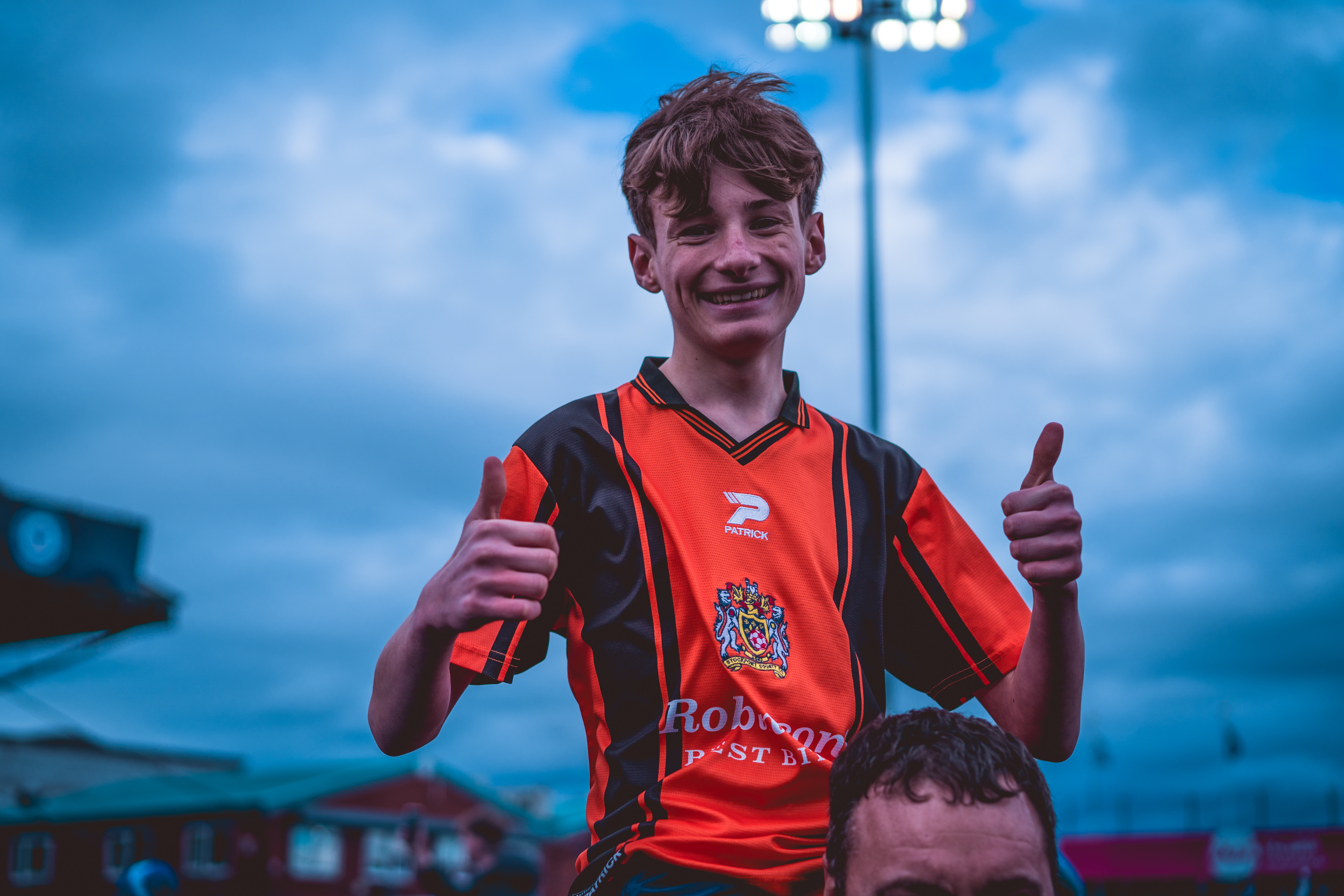 fan in stockport county kit celebrating