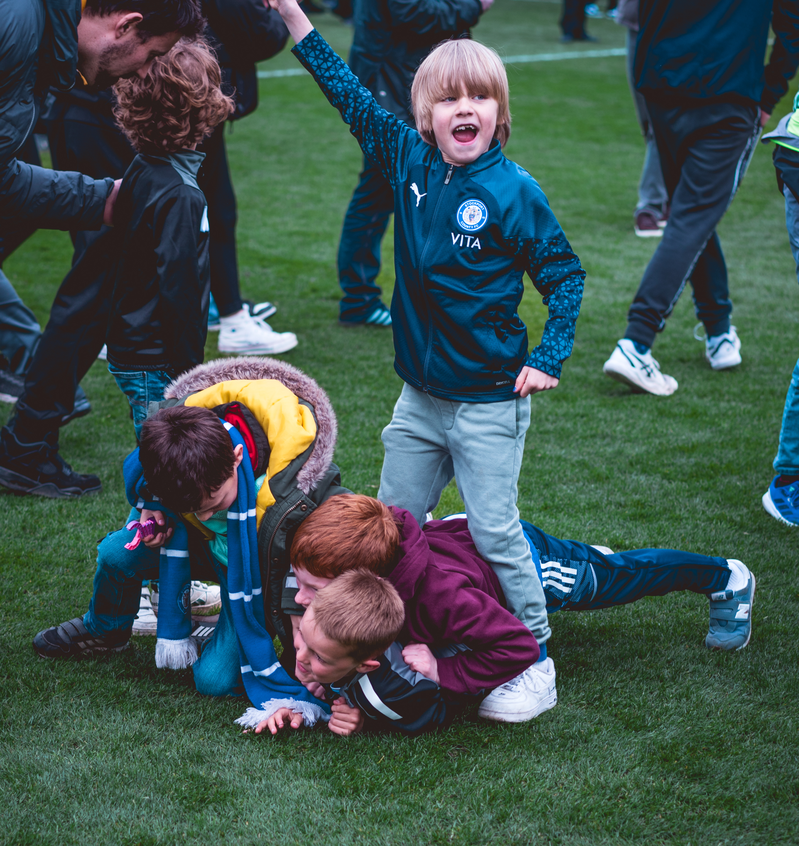 kid celebrating stockport county's promotion